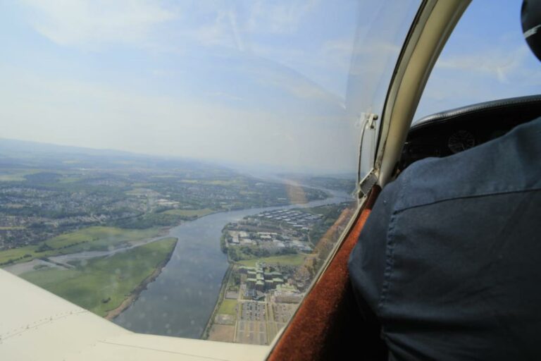 Aerial view of river from small aircraft window