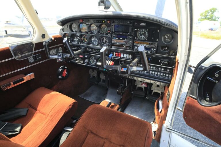Detailed cockpit of a small aircraft with instruments