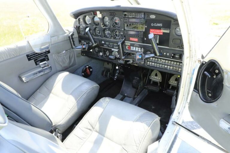 Interior of a small aircraft cockpit with instruments