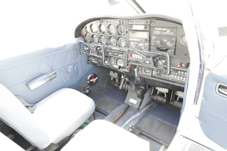 Interior cockpit view of light aircraft with instruments