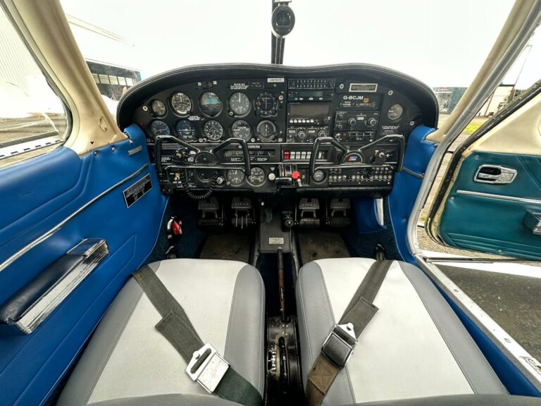 Detailed view of airplane cockpit with blue accents