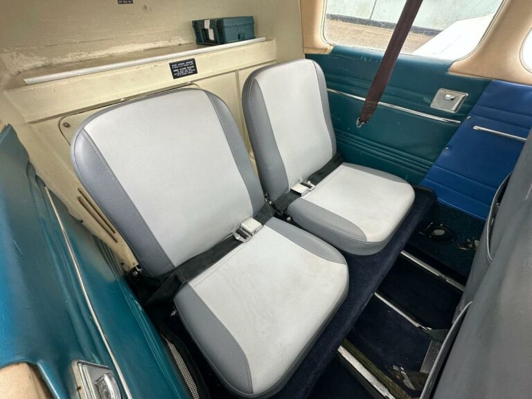 Vintage car interior with blue and grey seats